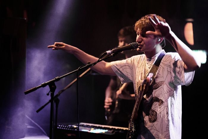 Glass Animals conducting their service.