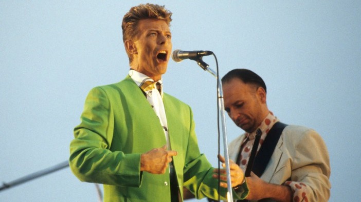 David Bowie performing with Tin Machine guitarist Reeves Gabrels in 1991. Kevin.Mazur/WireImage/Getty Images
