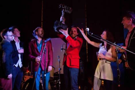 Venya lifts aloft the GIT Inspiration Award.jpg