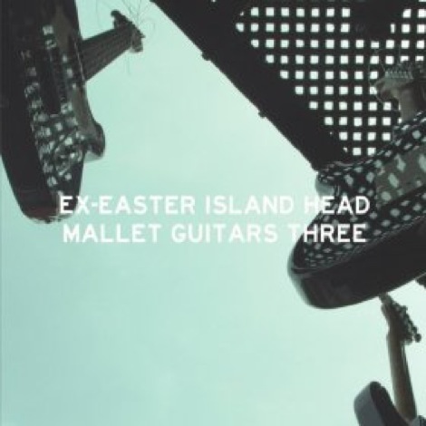 ex-easter-island-head-mallet-three.jpg