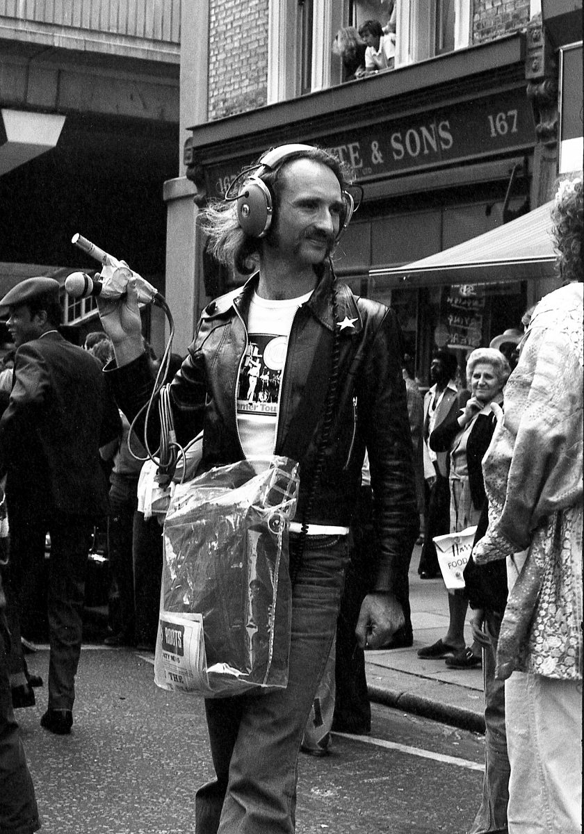 Holger Czukay at Notting Hill Carnival 1978 with his beloved Nakamichi tape recorder. Photo Tony Withers